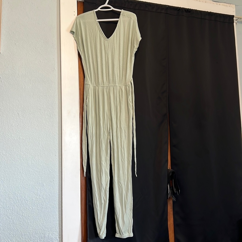 Pale green stretchy jump suit